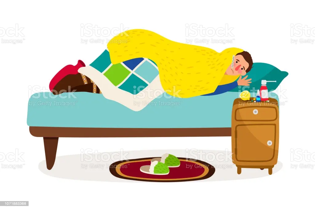 personne malade sous la couette